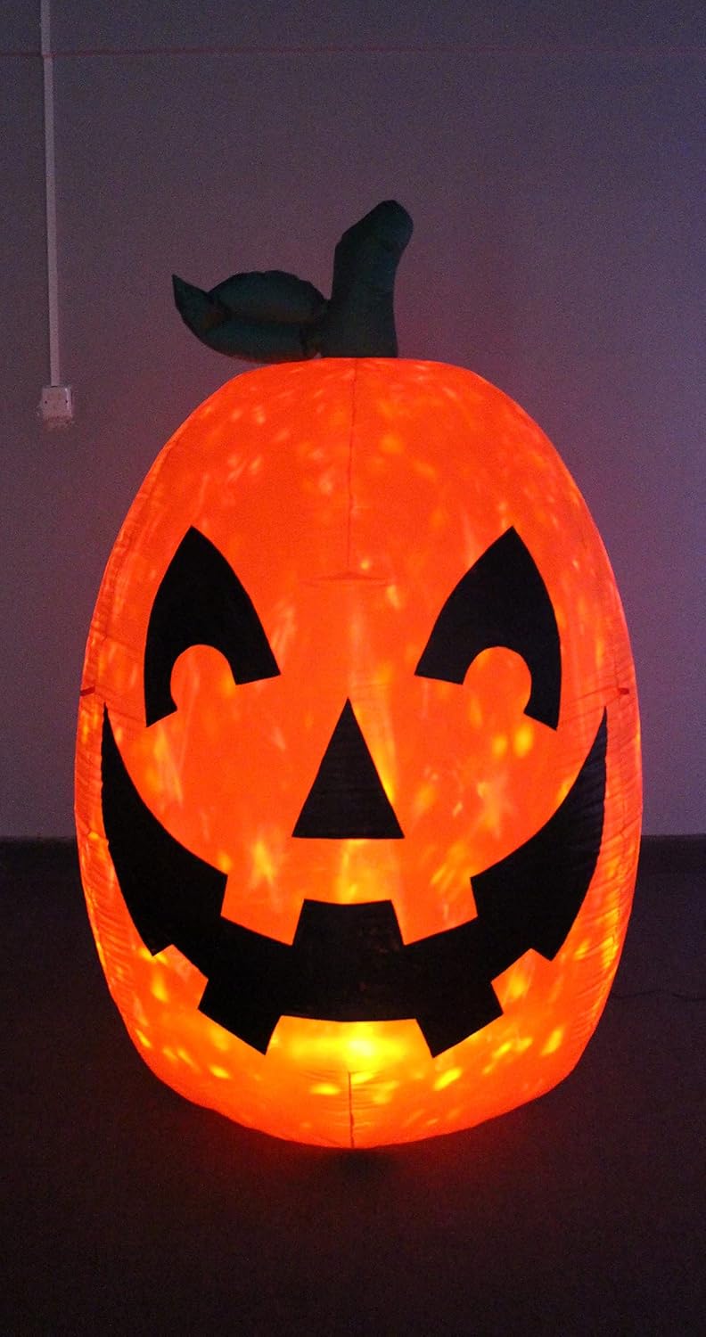 Glowing orange inflatable jack-o'-lantern with a curled stem