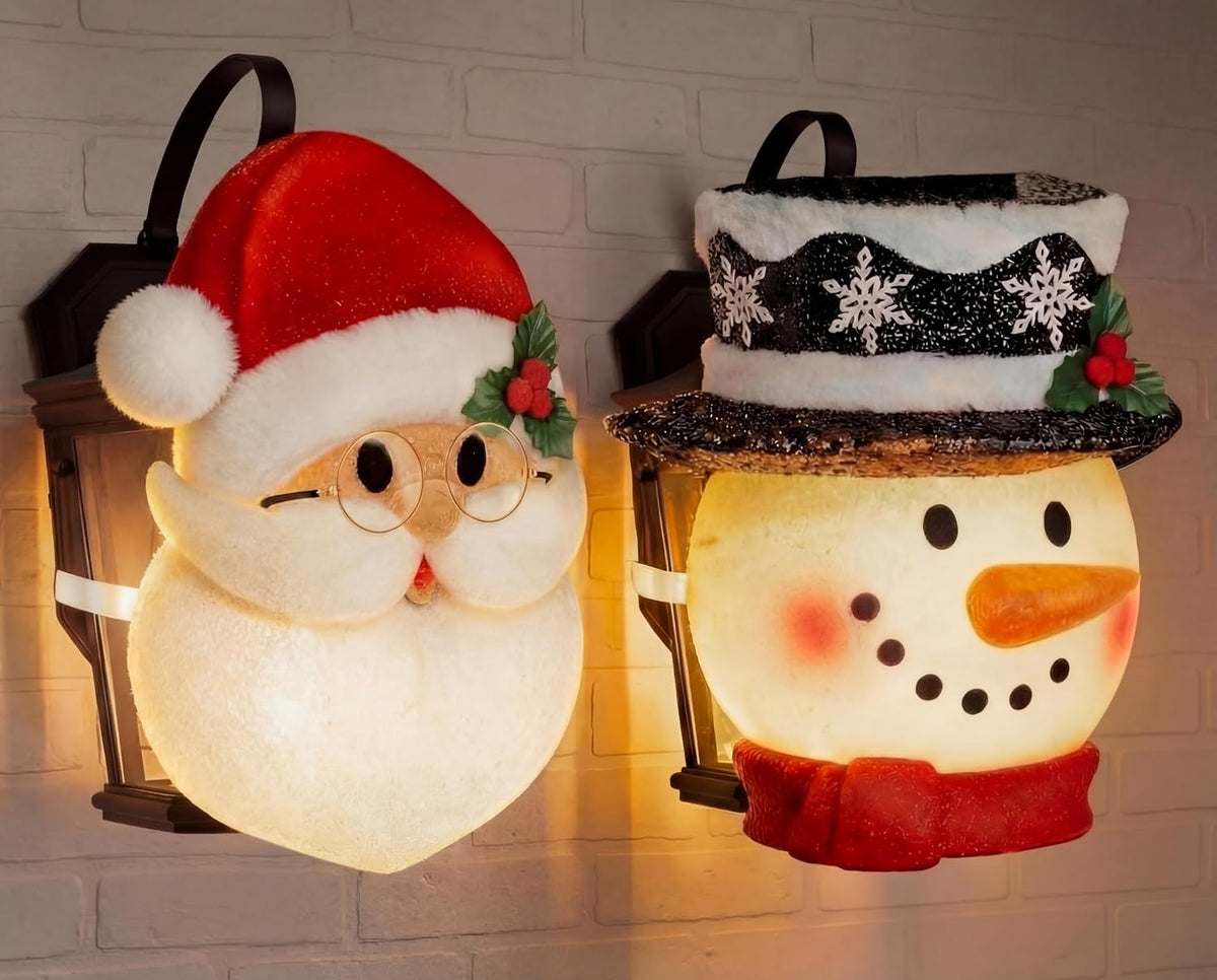 Porch light covers shaped like Santa and a snowman face