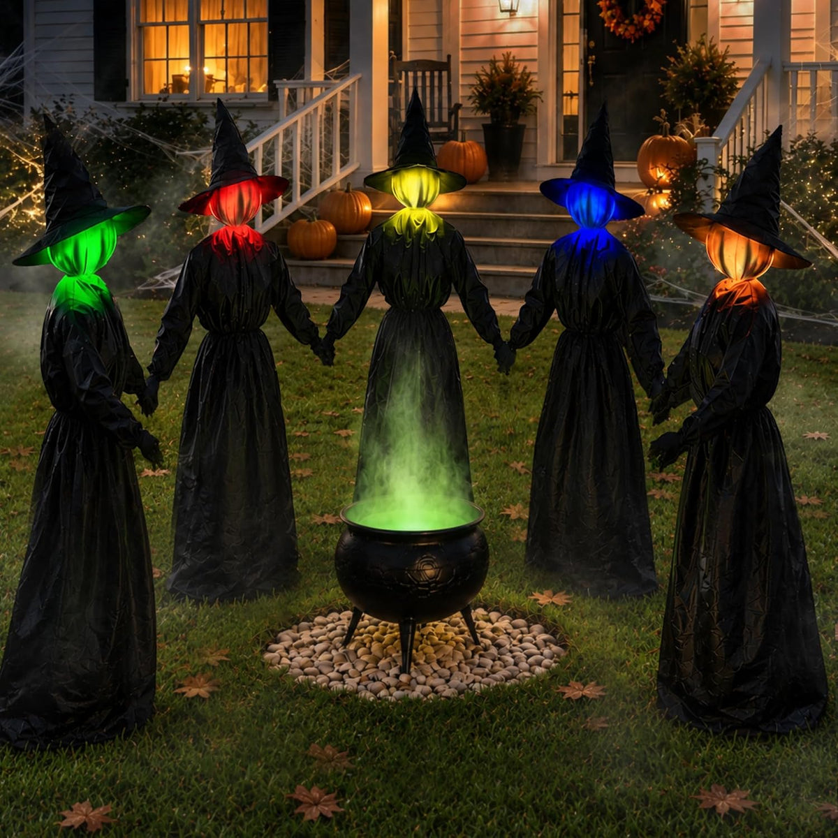 Five hooded witches holding hands around a glowing green cauldron